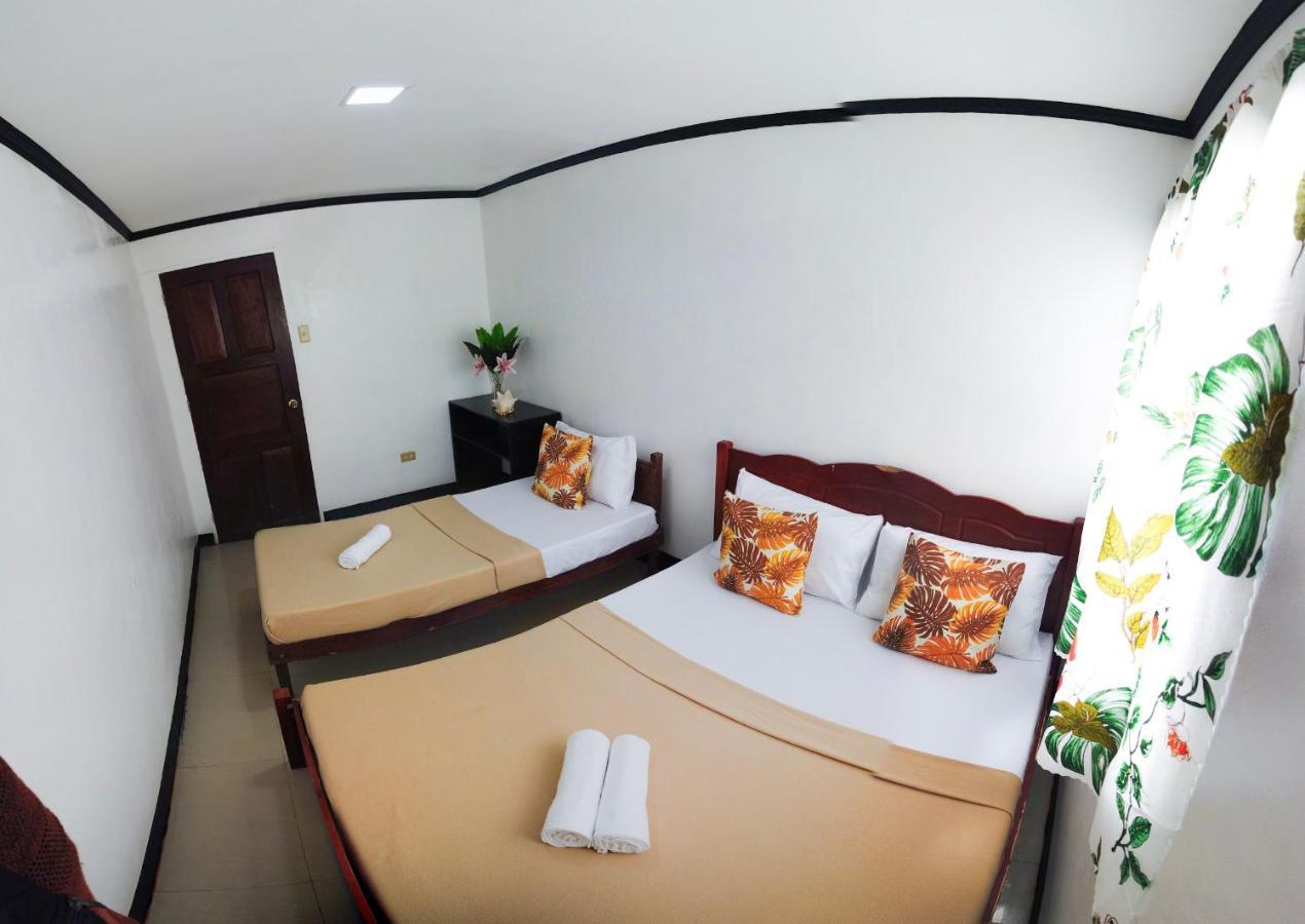 Amparo'S Tourist Inn - Coron Bagian luar foto